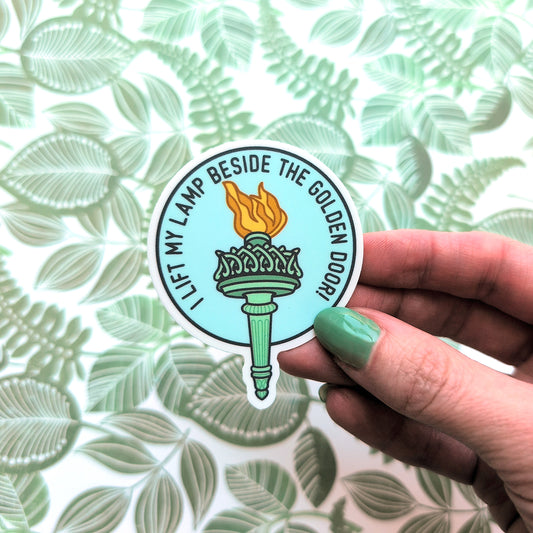 I lift My Lamp Beside The Golden Door Sticker